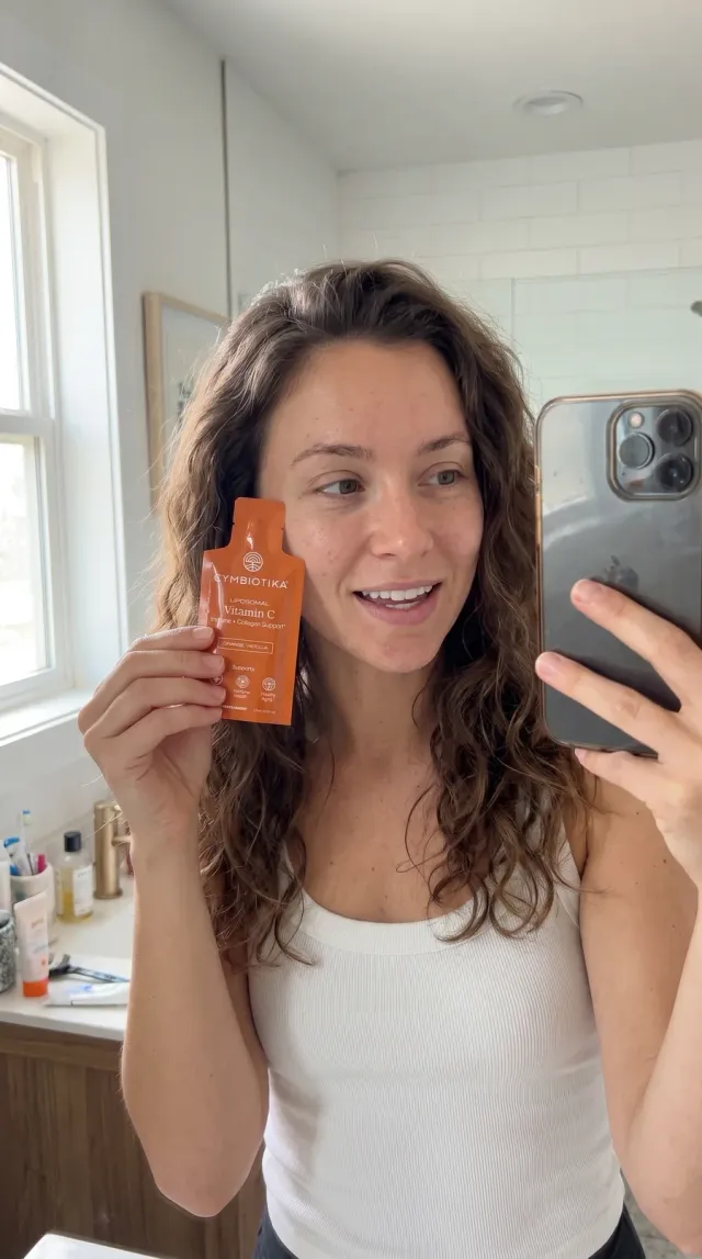 A creator films a morning routine with Cymbiotika Liposomal Vitamin C